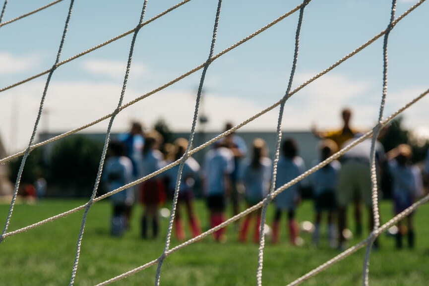 Kids Football Soccer Training.Young Athletes with Football Ball