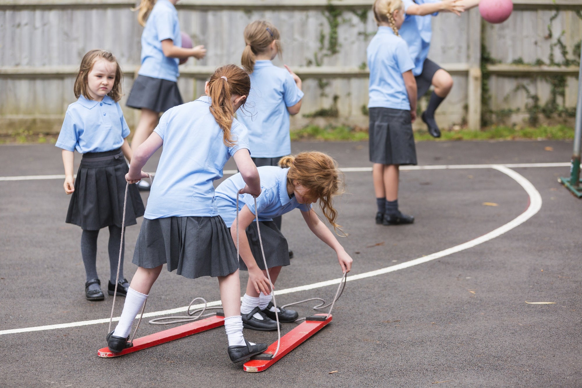 Children playing games in school