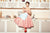 vintage woman drinking tea sitting in the kitchen.