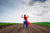 boy with cape in the countryside