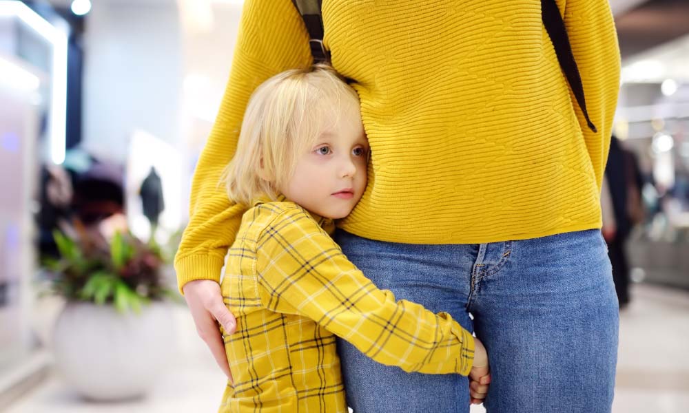 boy holding his mother