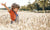 little boy in wheat field