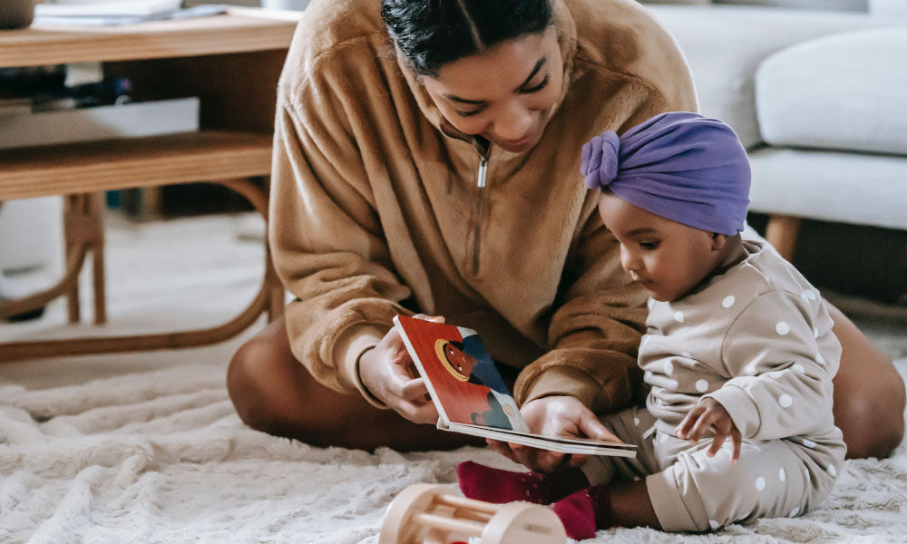 mom reading to kid