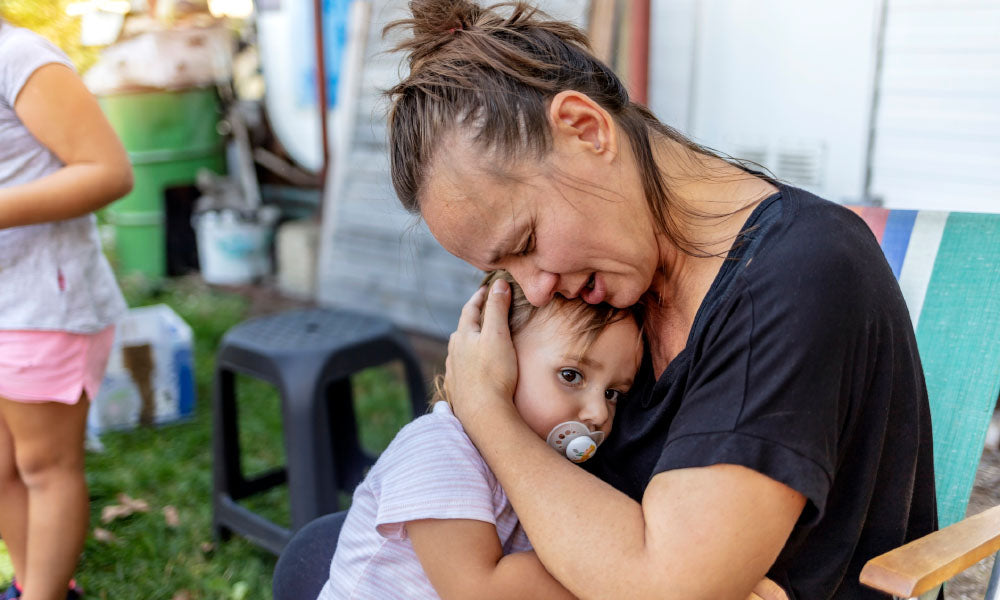 mother holding child